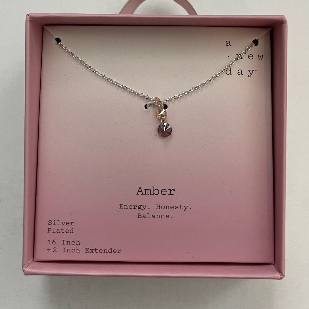 New in box never worn beautiful necklace - amber (energy, honesty, balance)